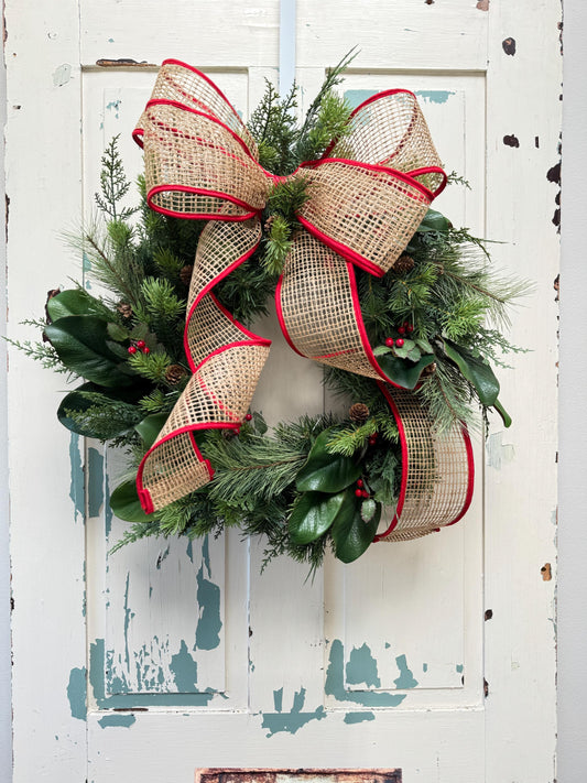 holiday mixed 
greenery wreath with red and burlap bow